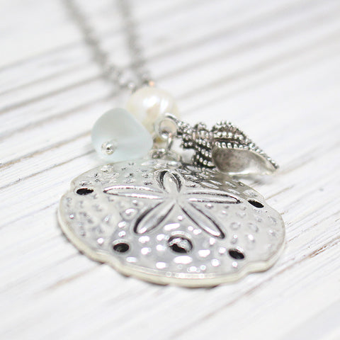 files/LargeSandDollar_SeaGlass_PearlNecklaceCloseUp.jpg