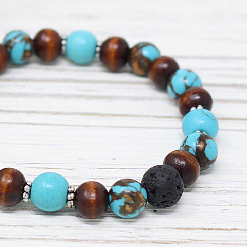 products/reconsitutedsiderolite_turquoise_woodandlava_closeup.jpg